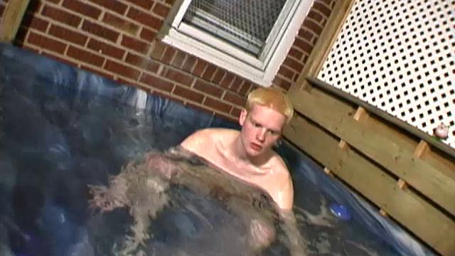 Horny 18 year old Andrew is naked in the hot tub when the urge to jerk off overcomes his blond self. The boy starts working on his big dick and soon it's rock hard.