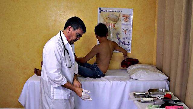 Asian twink asstoyed by doctor in infirmary
