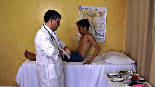 Asian twink asstoyed by doctor in infirmary