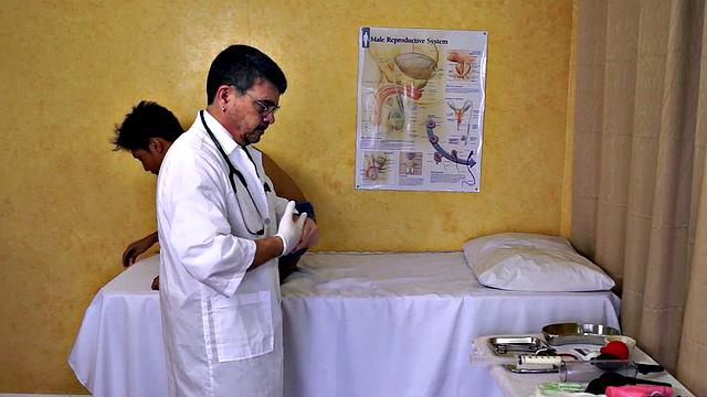 Asian twink asstoyed by doctor in infirmary