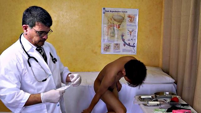 Asian twink asstoyed by doctor in infirmary