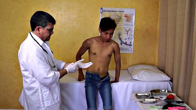 Asian twink asstoyed by doctor in infirmary