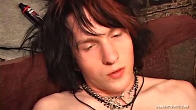 Jett is laid out on the sofa and rubbing his crotch, preparing to jack off for us. After stripping naked, he strokes his hard cock, and then inserts his butthole with fingers and a jelly sex toy. Soon the young man is pumping out a huge cum load.