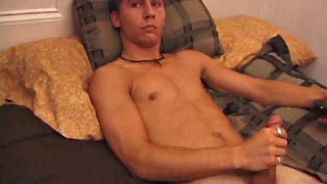 After storing his load for about a week, Brock is back to stroke one out for us. He makes himself at home on the bed, strips naked, and starts working his dick.