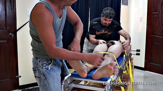 Mike and Ricky caught Vahn stealing their diamonds, but not before he hid them. So knowing how ticklish this cute Asian twink is, they strap him down for interrogation.