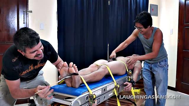 Mike and Ricky caught Vahn stealing their diamonds, but not before he hid them. So knowing how ticklish this cute Asian twink is, they strap him down for interrogation.