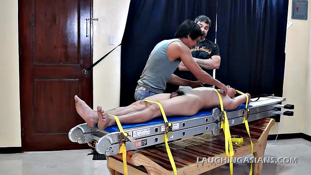 Mike and Ricky caught Vahn stealing their diamonds, but not before he hid them. So knowing how ticklish this cute Asian twink is, they strap him down for interrogation.