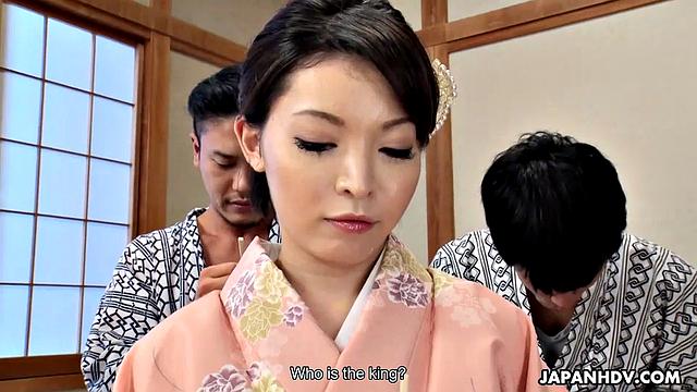 Hikaru Kirishima in her kimono as the hostess of an office orgy