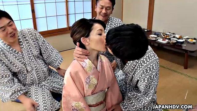 Hikaru Kirishima in her kimono as the hostess of an office orgy