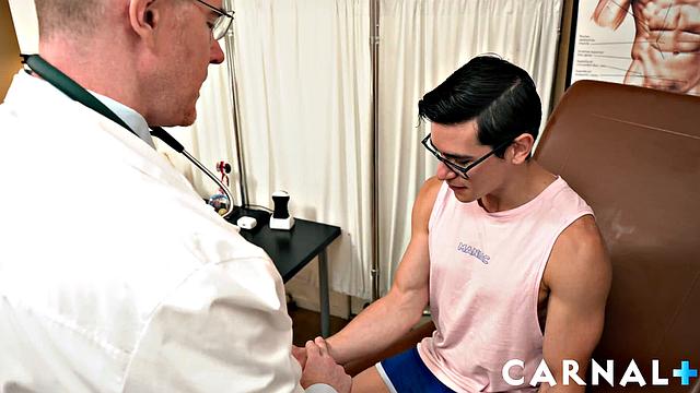 dr. wolf checks his patient's package and it's one thorough gay exam