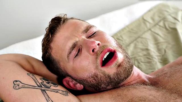 Unshaven hunk sprays after stripping and jerking off