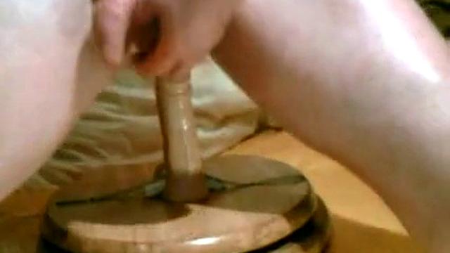 Man Sat On Wood Stick