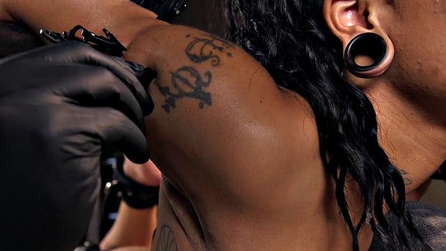 Bound subject toyed with dildo during punishment