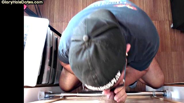 Dirty perverted nympho at gloryhole sucks and jerks dick