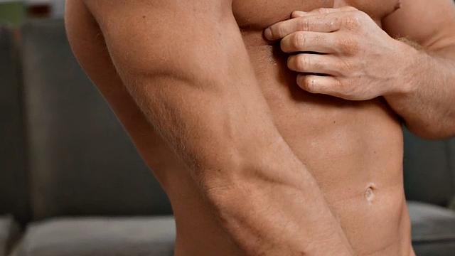 Eager athletic jock solo masturbating in gym until climax