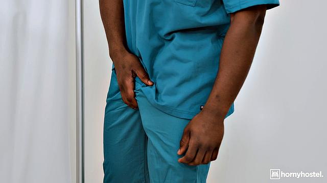 Nurse Caring For Two Men