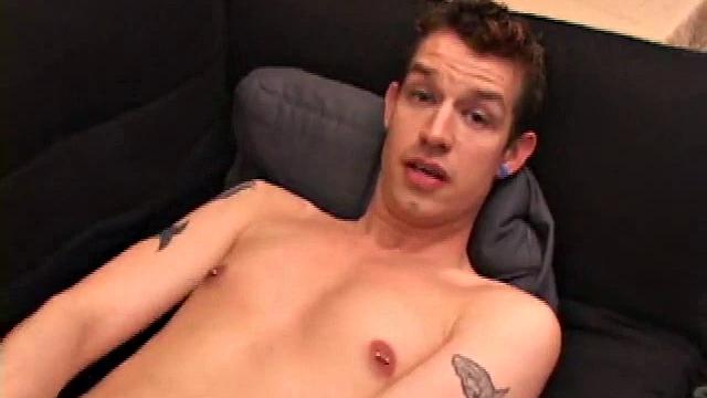 Elliot Cross unzips his jeans and pulls out a growing cock. After giving it a good stroking he stuffs fingers up his ass for added stimulation. This does the trick and soon he's shooting a warm cum load