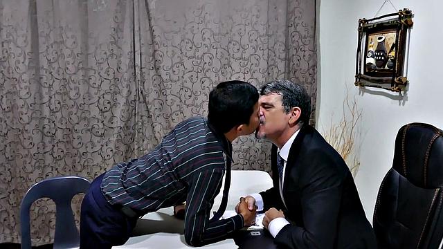 Asian twink barebacked by white business in office