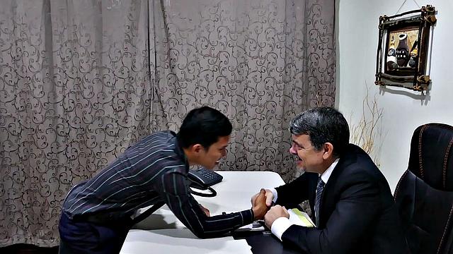 Asian twink barebacked by white business in office