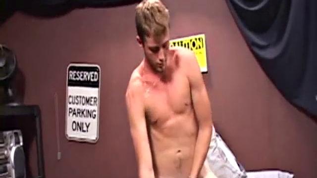 Zack Perry strokes his hard cock and moans with pleasure