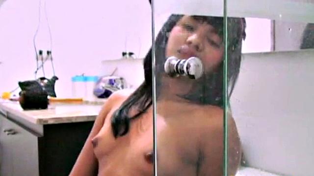 Tobie Teen removes her clothes showing her small tits and gets seductive. She shows her nipples and tight pussy. She fingers hard until orgasm