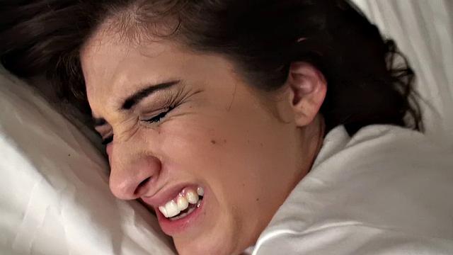 Brunette with a bald pussy gets her ass fingered while wearing a thong