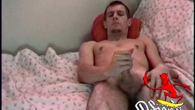 After stripping down and lubing up, Jonathan Priest starts jacking off. Tugging on his balls and spreading his hairy legs and ass, Jonathan bones up pretty easily. As he strokes more firmly, he adds lotion from time to time, and bites his tongue.