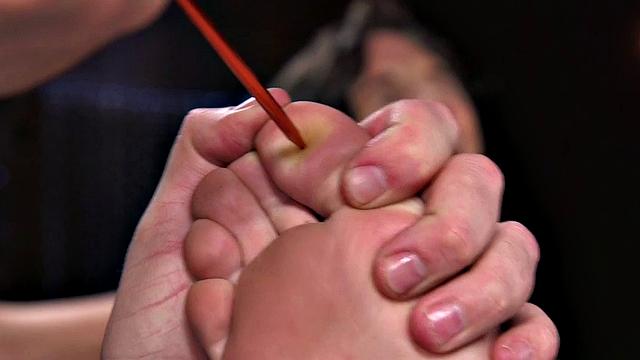 Bastinado session for gagged slut