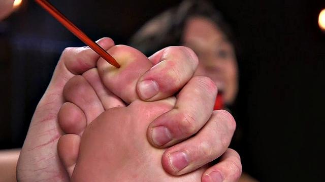 Bastinado session for gagged slut