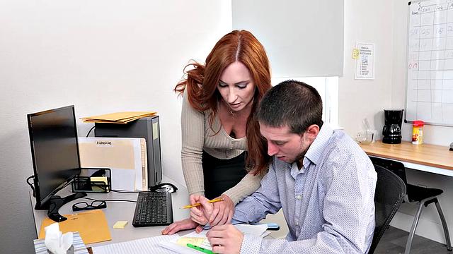 Sexy redhead Sophia Locke has IT guy deliver his jizz on her tits