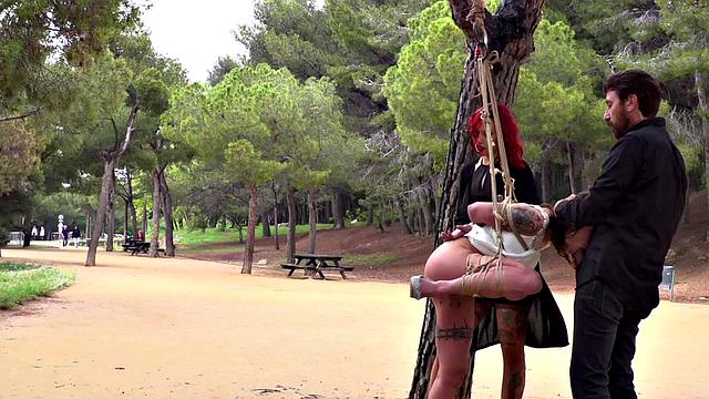 Submissive slut gets whipped & spanked in public for public nudity & threesome domination