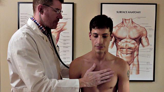 Petite 21yo guy fucked by doctor in infirmary after check