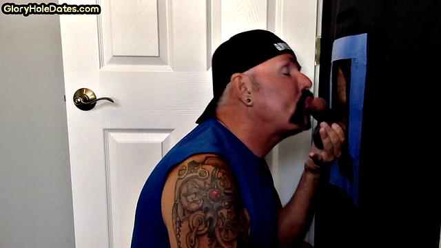 Gloryhole homemade DILF with tattoo sucks and jerks cock