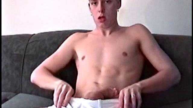 Roar strokes his thick cock and shows off every inch