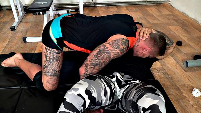 Tattooed nympho hunk fucked by nice stud in anal hole