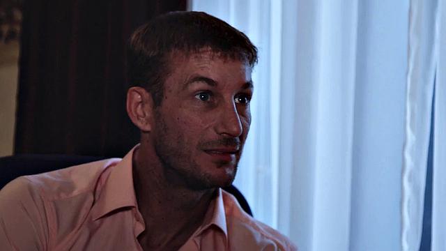 Man pounds busty babe in the office while she licks his shaft