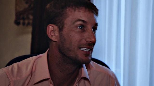 Man pounds busty babe in the office while she licks his shaft