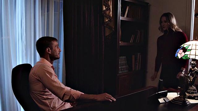 Man pounds busty babe in the office while she licks his shaft