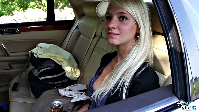 Girl leans out car window to suck