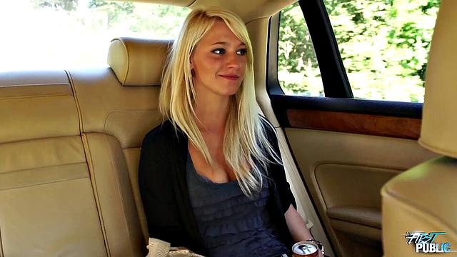 Girl leans out car window to suck