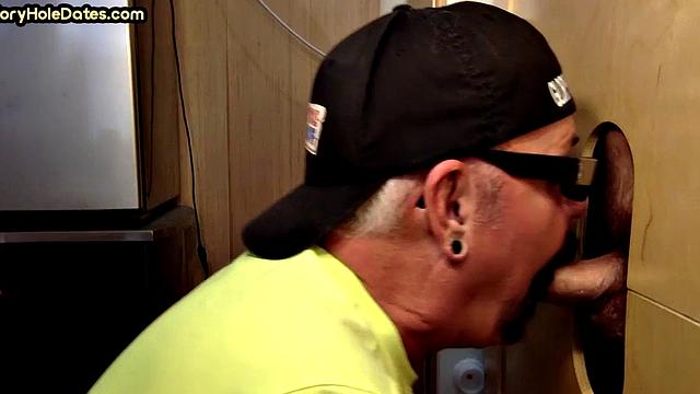 Gloryhole DILF deepthroats real cock of his neighbor