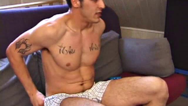 After work, Ryan cues up a porn video and begins stripping off his clothes. He's totally into himself and poses for the camera.