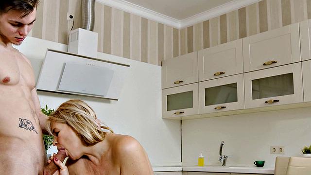 Kinky blonde MILF humiliates her man while fucking in the kitchen