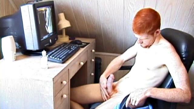 Seated in front of the computer, Tristian pulls out his cock, lubes it up and starts jacking off to the porn video playing. After showing us his butt, and working himself to the edge, Tristian pumps his load onto the computer screen.