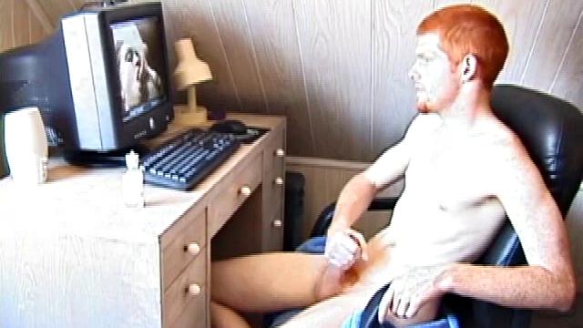 Seated in front of the computer, Tristian pulls out his cock, lubes it up and starts jacking off to the porn video playing. After showing us his butt, and working himself to the edge, Tristian pumps his load onto the computer screen.