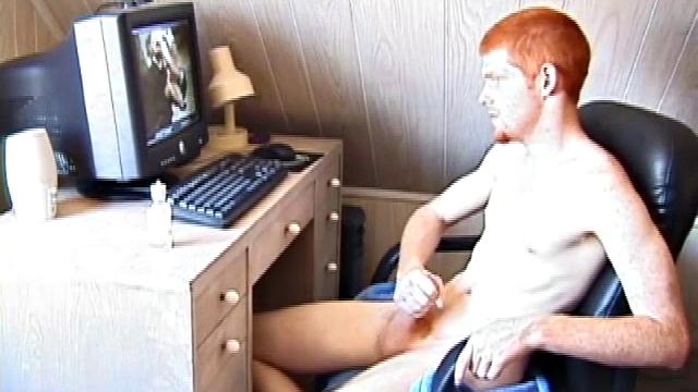 Seated in front of the computer, Tristian pulls out his cock, lubes it up and starts jacking off to the porn video playing. After showing us his butt, and working himself to the edge, Tristian pumps his load onto the computer screen.