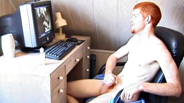 Seated in front of the computer, Tristian pulls out his cock, lubes it up and starts jacking off to the porn video playing. After showing us his butt, and working himself to the edge, Tristian pumps his load onto the computer screen.