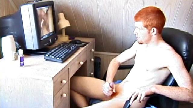 Seated in front of the computer, Tristian pulls out his cock, lubes it up and starts jacking off to the porn video playing. After showing us his butt, and working himself to the edge, Tristian pumps his load onto the computer screen.