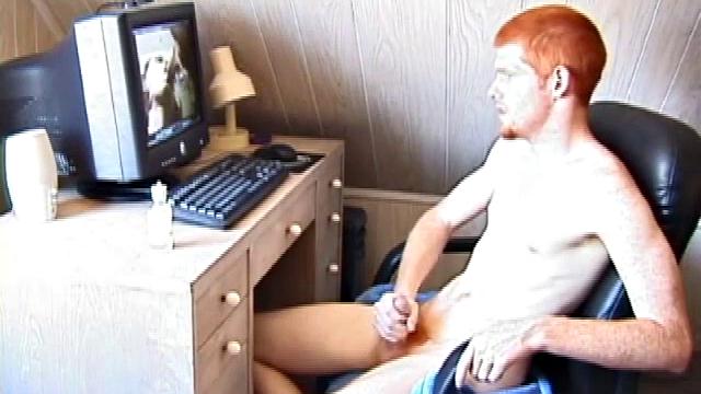 Seated in front of the computer, Tristian pulls out his cock, lubes it up and starts jacking off to the porn video playing. After showing us his butt, and working himself to the edge, Tristian pumps his load onto the computer screen.