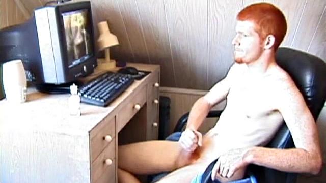 Seated in front of the computer, Tristian pulls out his cock, lubes it up and starts jacking off to the porn video playing. After showing us his butt, and working himself to the edge, Tristian pumps his load onto the computer screen.